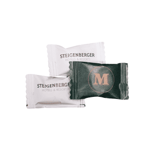 Papieren flowpack met 1 Mentos mint of fruittablet